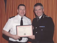 PC Lee Wilcos receiving an award.  Photo copyright of South Yorkshire Police